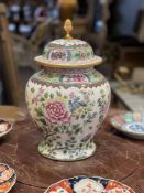 A FRENCH FAMILLE ROSE STYLE HAND PAINTED VASE AND COVER