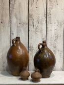 A COLLECTION OF FOUR 18TH CENTURY GERMAN STONEWARE JUGS