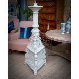 A PIRANESI STYLE PAINTED WOOD TORCHERE