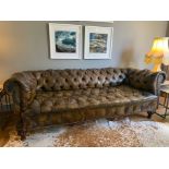 A BUTTON BACK LEATHER UPHOLSTERED CHESTERFIELD SOFA