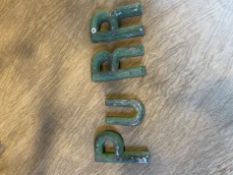 A SET OF FOUR PAINTED ZINC LETTERS