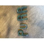 A SET OF FOUR PAINTED ZINC LETTERS