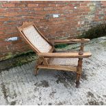 A 19TH CENTURY STYLE TEAK PLANTATION CHAIR