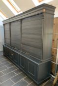 A LARGE TAMBOUR FRONTED BOOKCASE / SHOP DISPLAY CABINET