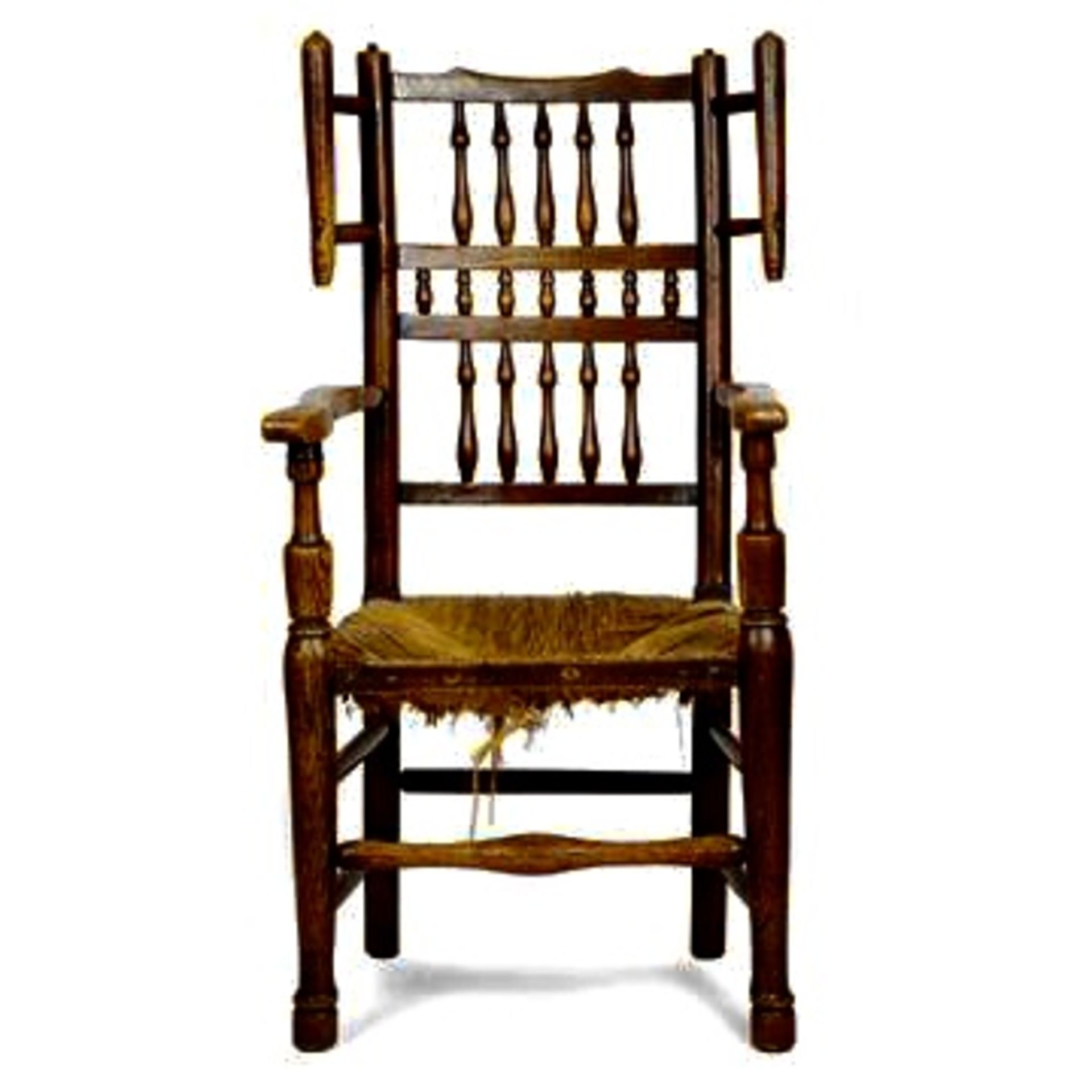 A 19TH CENTURY PROVINCIAL (LANCASHIRE) SPINDLE BACK ELBOW CHAIR