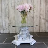 A GLASS AND PAINTED WOOD CORINTHIAN COLUMN COFFEE TABLE
