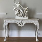 A WHITE PAINTED WOOD HALL TABLE IN THE MANNER OF WILLIAM KENT