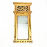 AN EARLY 19TH CENTURY SWEDISH KARL JOHAN PERIOD WALL MIRROR