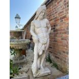 A CLASSICAL STYLE, NEAR LIFE-SIZE COMPOSITE STONE FIGURE OF HERCULES