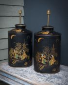 A PAIR OF CHINEOISERIE DECORATED PAINTED METAL LAMP BASES