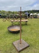 A LARGE PAIR OF 20TH CENTURY FRENCH FLOOR STANDING IRON BRIDLE HANGERS