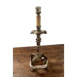 A 19TH CENTURY IRON CANDLESTICKS ADAPTED AS A LAMP BASE