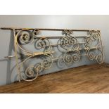 A PAIR OF FRENCH WROUGHT IRON BALCONY PANELS