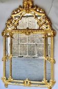 AN 18TH CENTURY STYLE GILTWOOD MIRROR