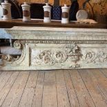 A LOUIS XV STYLE PAINTED WOOD OVER-DOOR