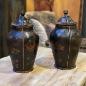 A PAIR OF REGENCY STYLE LACQUERED PAPIER MACHE TEA CANNISTERS