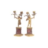 A PAIR OF 19TH CENTURY FRENCH GILT BRONZE AND MARBLE CHERUB CANDELABRA