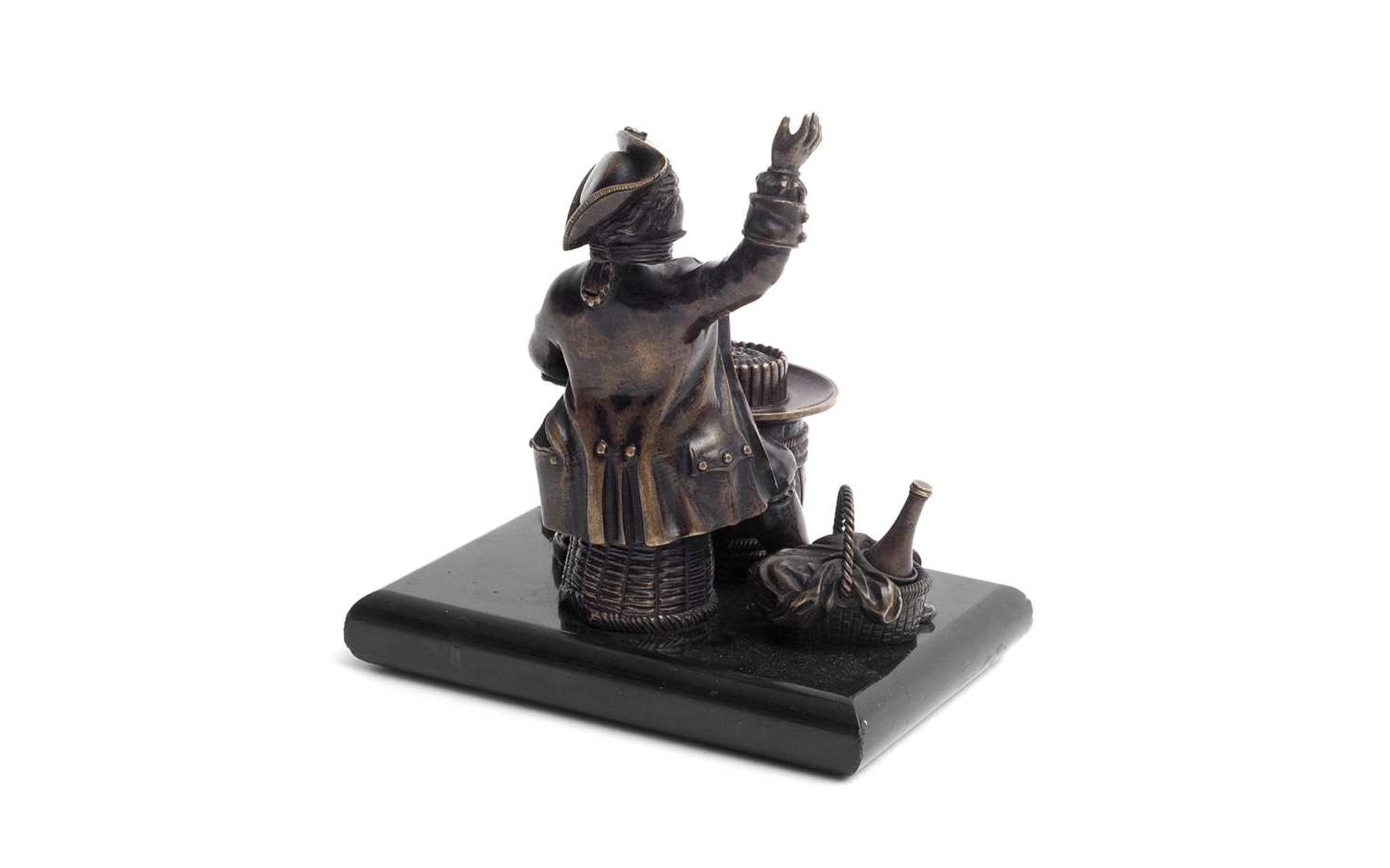 A REGENCY BRONZE PEN HOLDER IN THE FORM OF A JOVIAL GENTLEMAN - Image 3 of 3