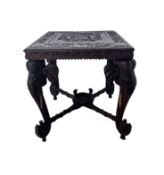 A LATE 19TH / EARLY 20TH CENTURY INDIAN CARVED WOOD ELEPHANT TABLE