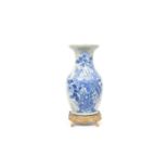 A 19TH CENTURY CHINESE QING PERIOD CELADON AND BLUE PORCELAIN AND ORMOLU VASE