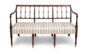 AN EARLY 19TH CENTURY GEORGE III MAHOGANY SETTEE