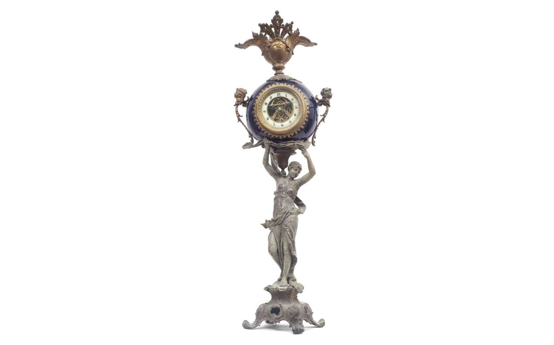 A LATE 19TH CENTURY FRENCH SPELTER AND PORCELAIN FIGURAL CLOCK