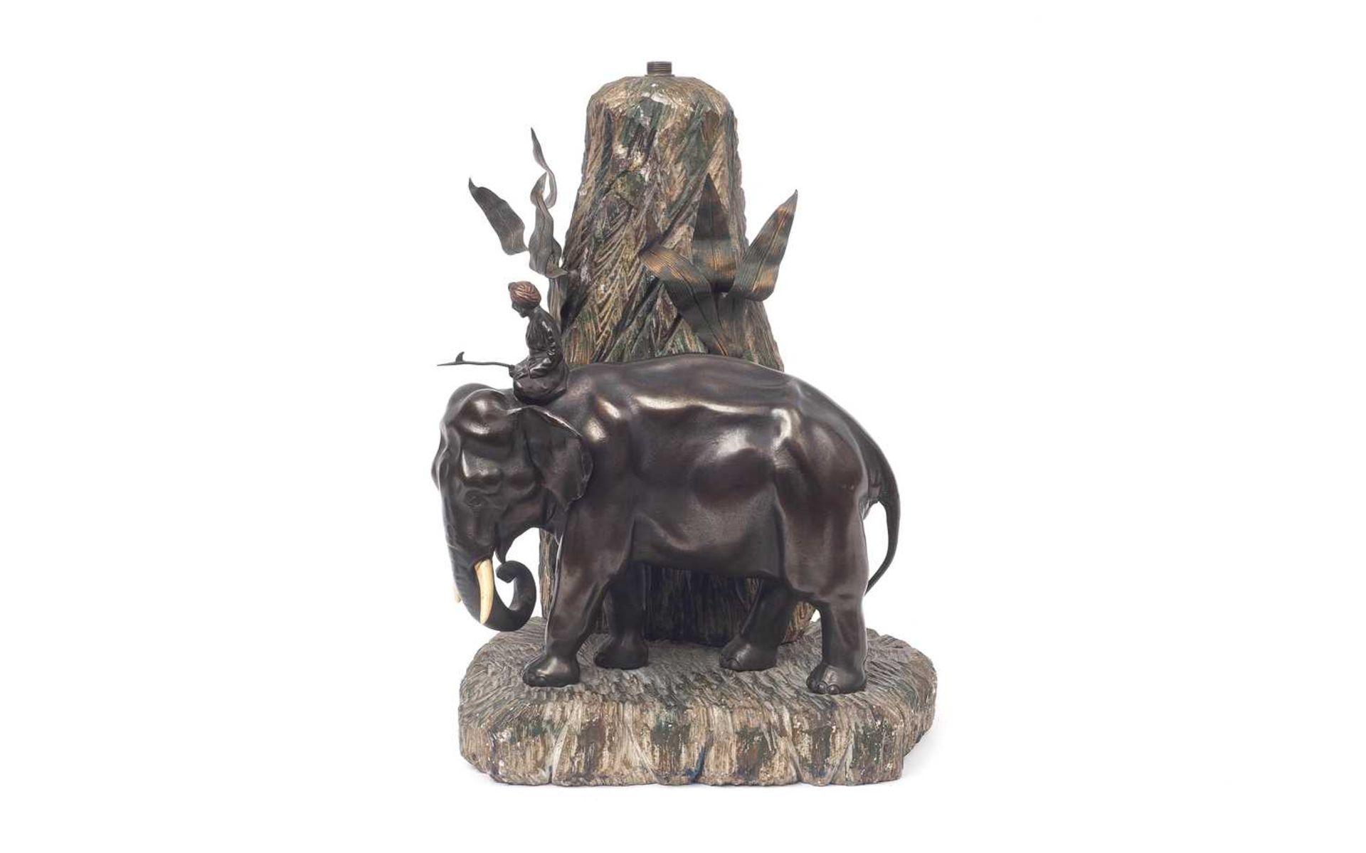AN EARLY 20TH CENTURY AUSTRIAN BRONZE AND ALABASTER ELEPHANT LAMP