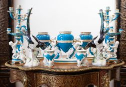 A 19TH CENTURY MINTON PORCELAIN PUTTI AND AMPHORA VASE TOGETHER WITH A PAIR OF VASES