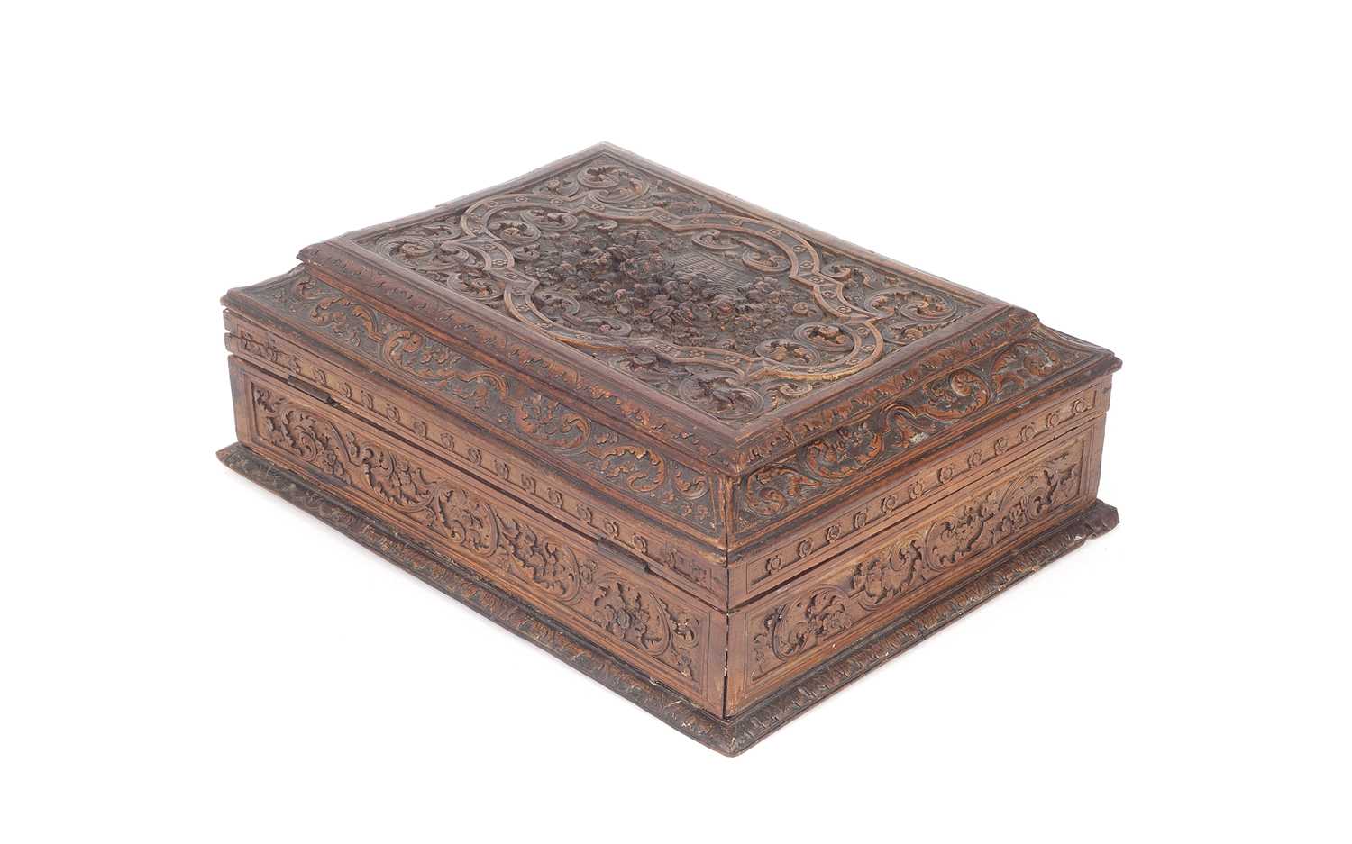 A 17TH / 18TH CENTURY CARVED FRUITWOOD BOX IN THE MANNER OF CESAR BAGARD OF NANCY, CIRCA 1700