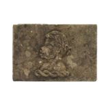 AN UNUSUAL STONE RELIEF DEPICTING AN AFRICAN GIRL