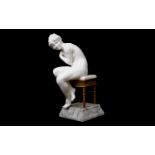 A LATE 19TH CENTURY ITALIAN ALABASTER FIGURE OF A NUDE GIRL ON A STOOL