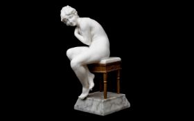 A LATE 19TH CENTURY ITALIAN ALABASTER FIGURE OF A NUDE GIRL ON A STOOL