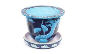 A 19TH CENTURY MINTON MAJOLICA JAPANESE STYLE JARDINIERE AND STAND