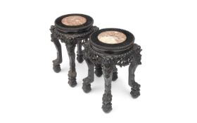 A PAIR OF 19TH CENTURY CHINESE CARVED HARDWOOD AND MARBLE MOUNTED TABLES