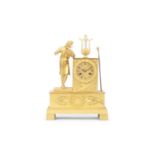 AN EARLY 19TH CENTURY EMPIRE PERIOD GILT BRONZE MANTEL CLOCK
