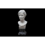 AN EARLY 20TH CENTURY LIFE-SIZE MARBLE BUST OF A LADY