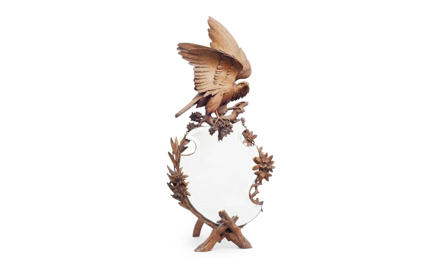 A LATE 19TH CENTURY BLACKFOREST CARVED EAGLE MIRROR