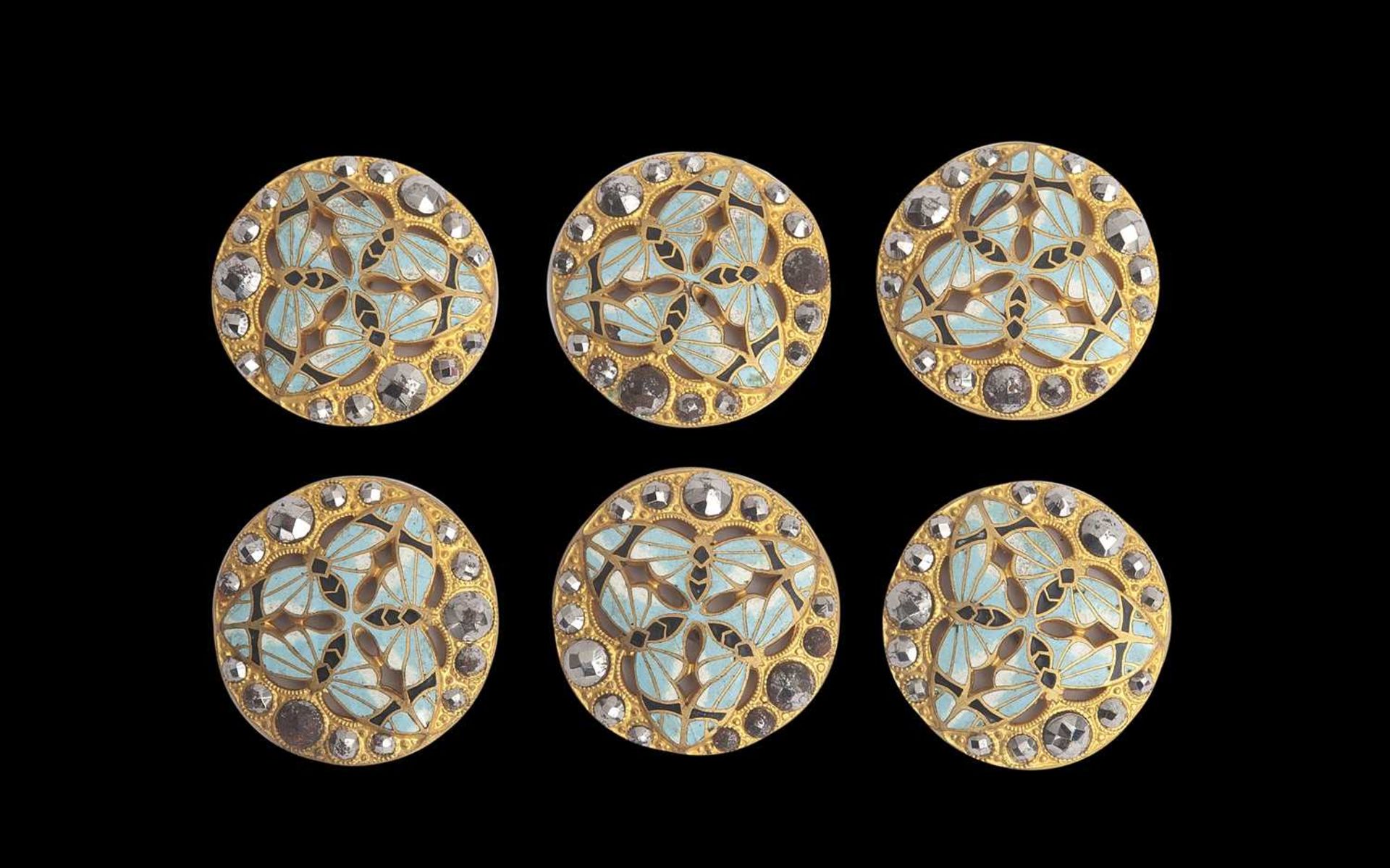 A SET OF SIX EARLY 20TH CENTURY GILT METAL, ENAMEL AND MARCASITE BUTTONS