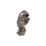 A 20TH CENTURY CARVED HARDSTONE PORTRAIT OF AN AFRICAN MAN