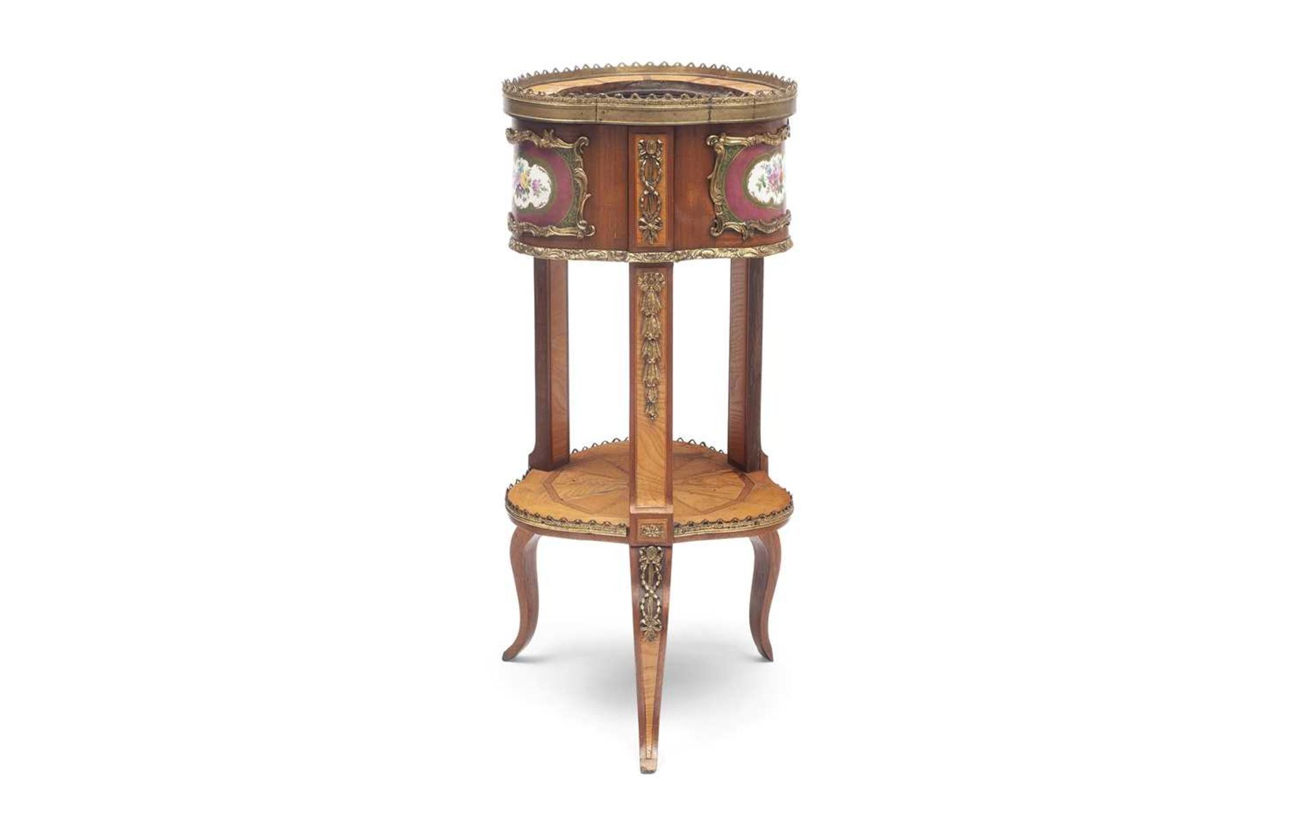 A LATE 19TH CENTURY FRENCH GILT METAL AND PORCELAIN MOUNTED JARDINIERE STAND