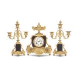 A 19TH CENTURY PATINATED AND GILT BRONZE MANTEL CLOCK SET