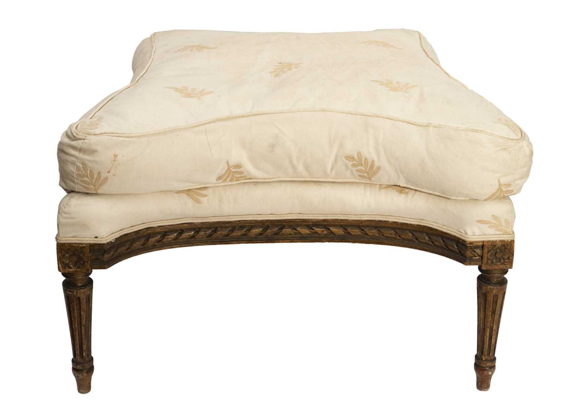 A LOUIS XVI STYLE GILTWOOD UPHOLSTERED STOOL