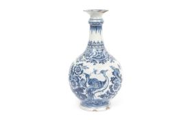 A BLUE AND WHITE DELFT STYLE VASE