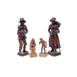 TWO PAIRS OF 19TH CENTURY AUSTRIAN CARVED WOOD FIGURES OF BEGGARS