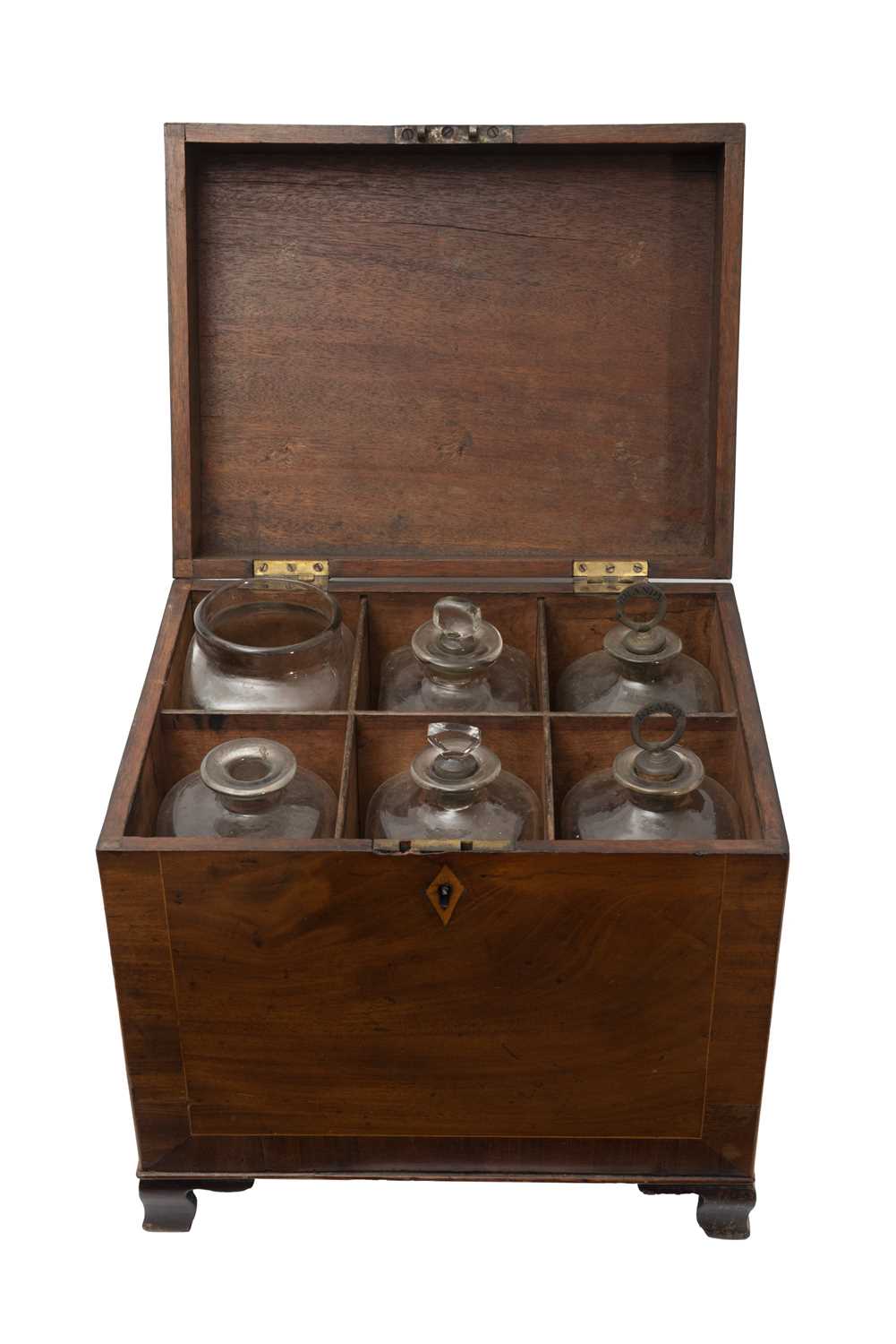 A GEORGIAN MAHOGAHY DECANTER BOX WITH 18TH CENTURY GLASS BOTTLES