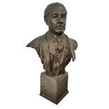 A 20TH CENTURY DANISH LIFE-SIZE BRONZE BUST OF A GENTLEMAN WITH MEDAL