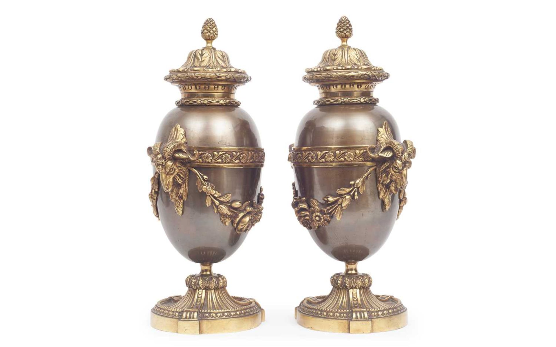 A PAIR OF NEO-CLASSICAL STYLE GILT METAL URNS - Image 2 of 2