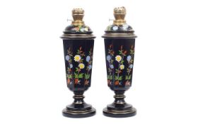 A PAIR OF LATE 19TH CENTURY PAINTED BLACK GLASS OIL LAMPS