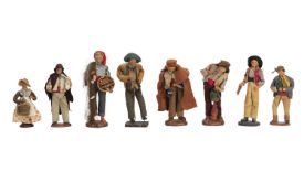 A COLLECTION OF EIGHT FRENCH TERRACOTTA SANTON FIGURES