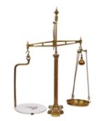 A SET OF LARGE VICTORIAN BRASS BEAM SCALES TOGETHER WITH WEIGHTS